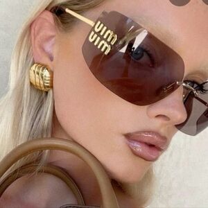 Miu Miu 54ys Violet/Gold Sunglasses